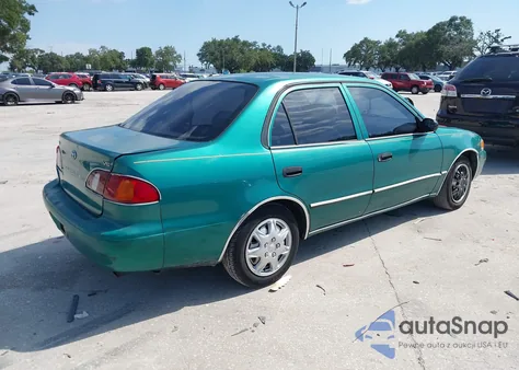 1998 Toyota Corolla Ve z USA, uszkodzony, nr VIN 1NXBR12E9WZ080912